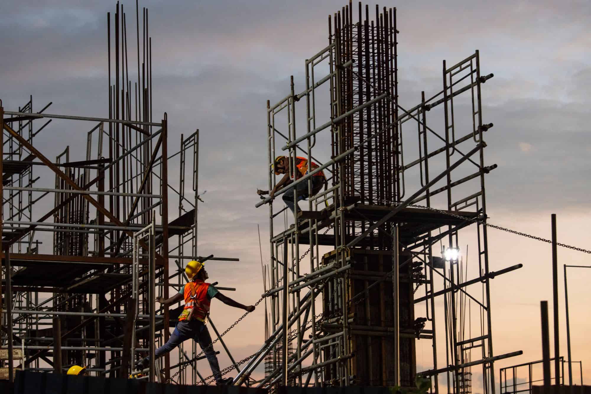 Construction workers in Sri Lanka head home after helping build a large China-backed shopping complex, in 2018.