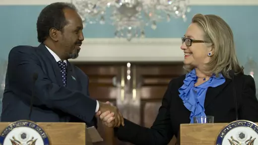 U.S. Secretary of State Hillary Clinton shakes hands with Somali President Hassan Sheikh Mohamud at the State Department. 