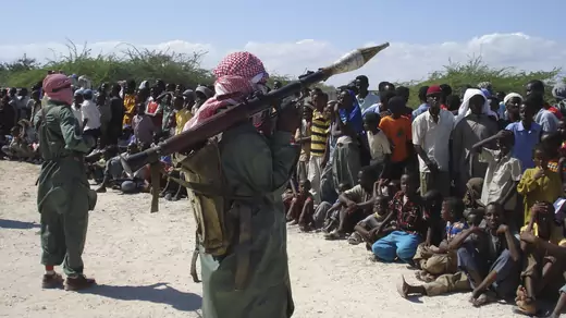 Al-Shabab militants display weapons on the outskirts of Mogadishu.